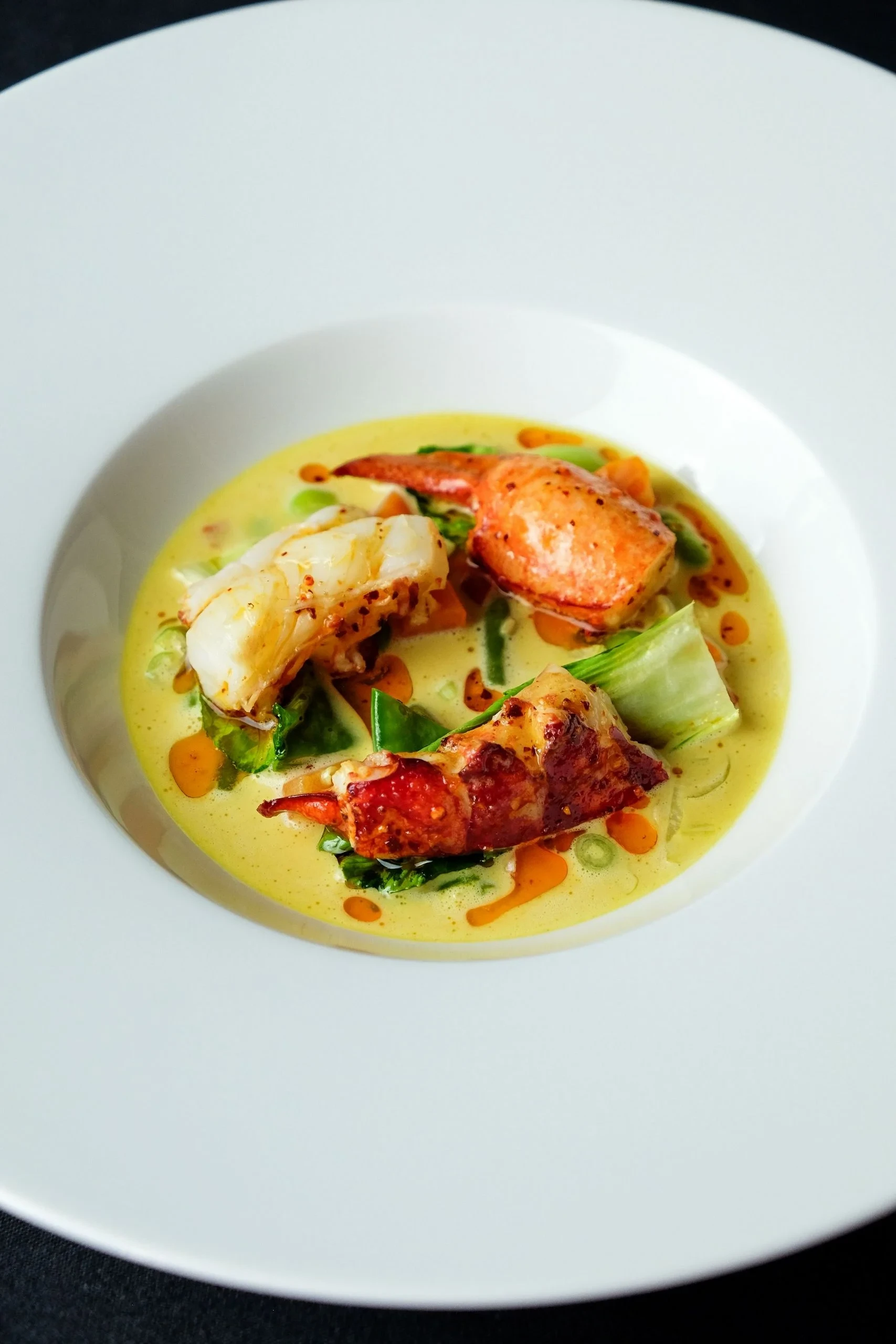Homard et légumes dans sauce crémeuse